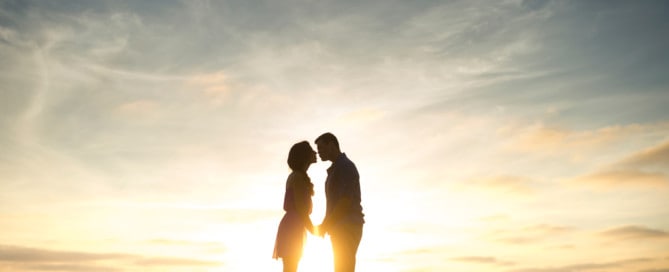 Silhouette of couple on beach