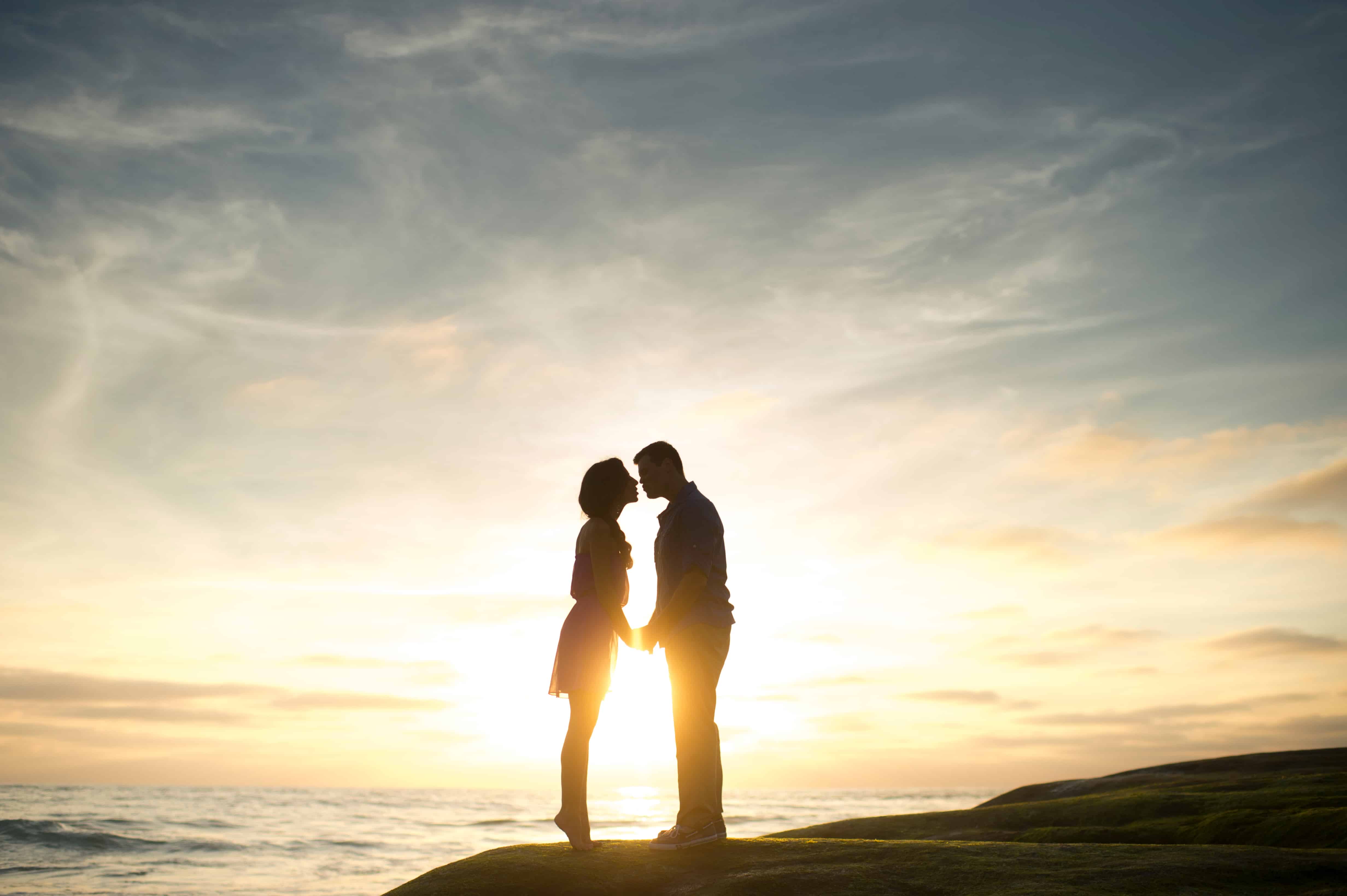Silhouette of couple on beach