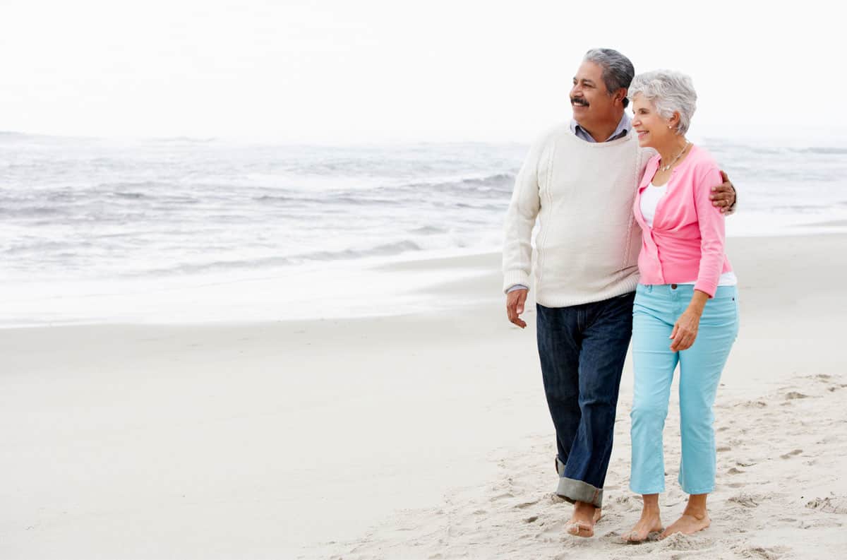 Couple walking on beach