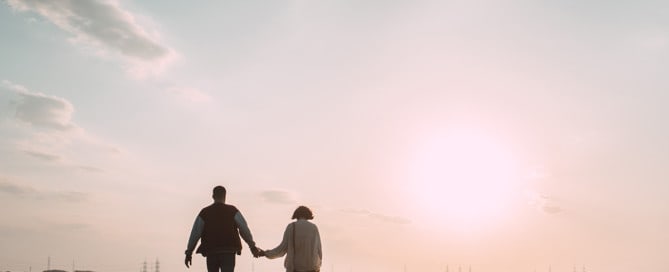 Couple holding hands