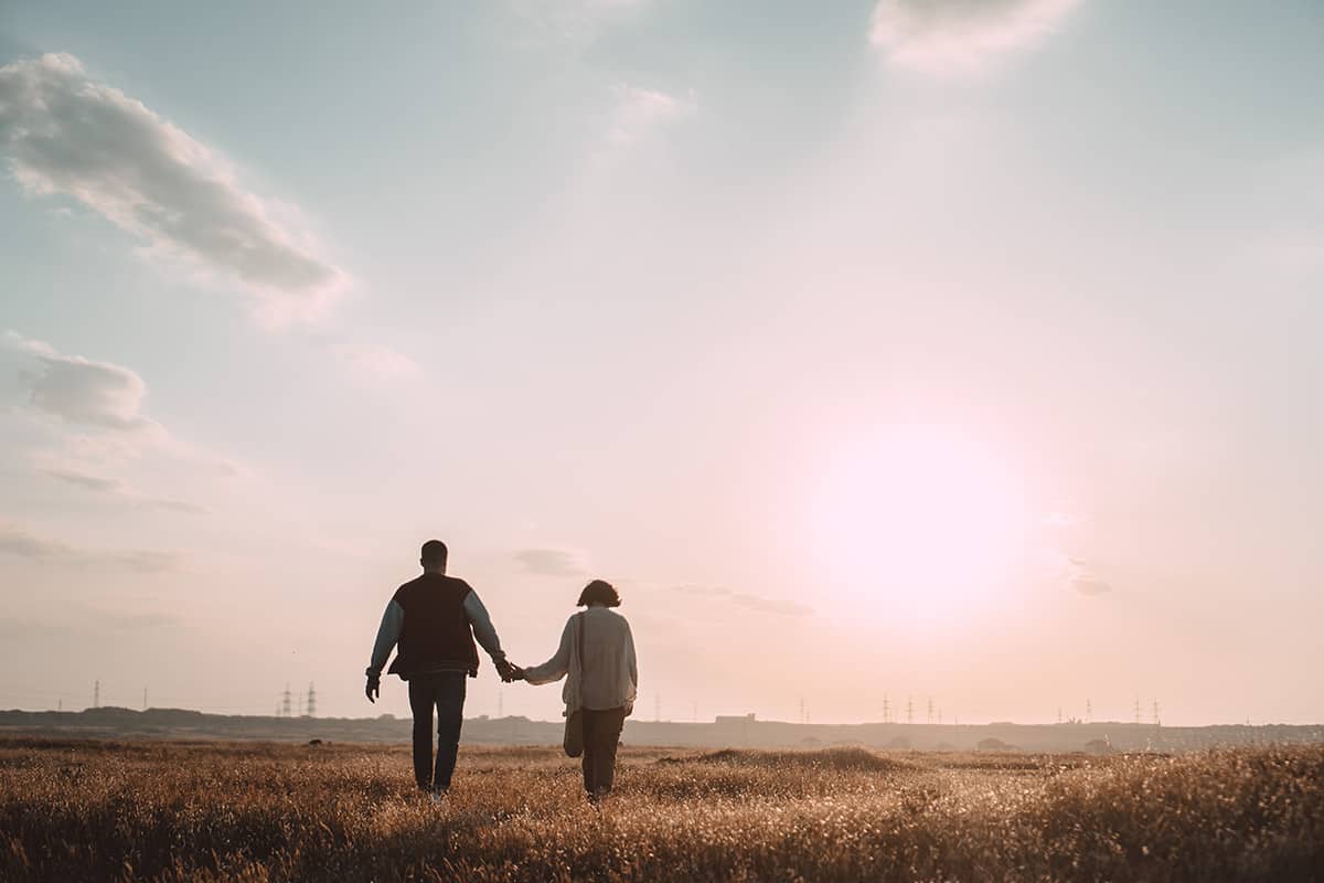 Couple holding hands