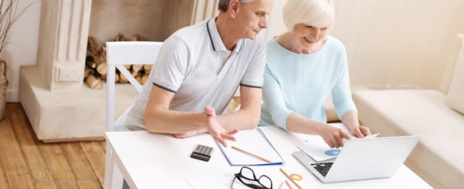 Couple looking at computer together