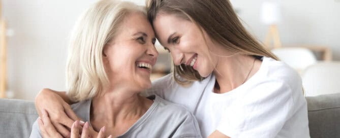 Younger woman hugs older woman - choosing a cremation provider in San Antonio, TX.