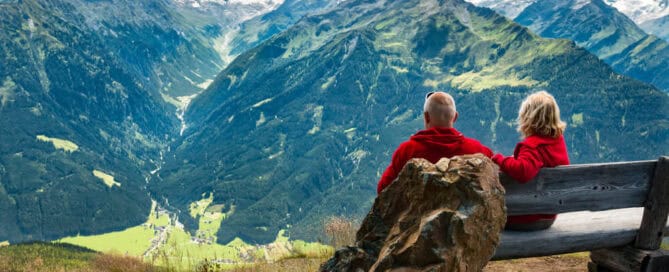 Couple looks at mountains - green cremation California.