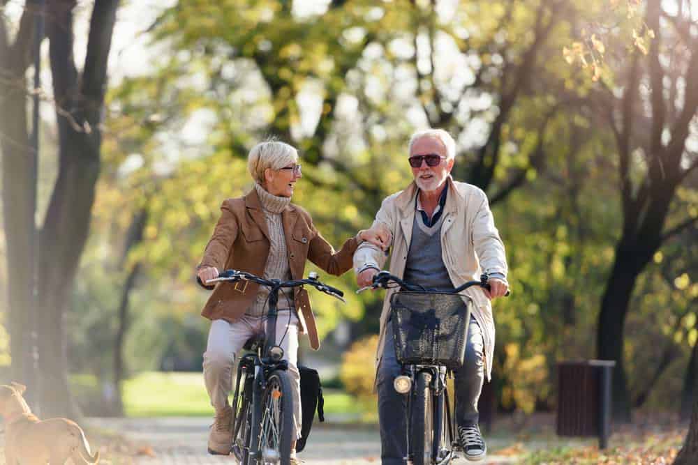 San-Diego-cremation-costs two family member bicyclists riding through San Diego