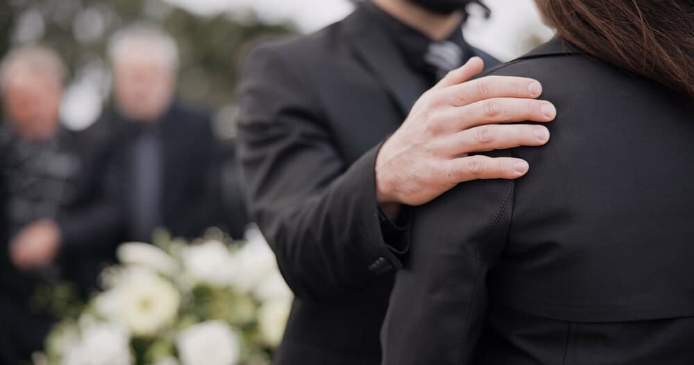 person shares the right things to say at a funeral to a grieving person