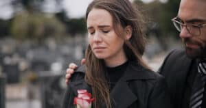 Person shares a few kind words to someone who is grieving a loss